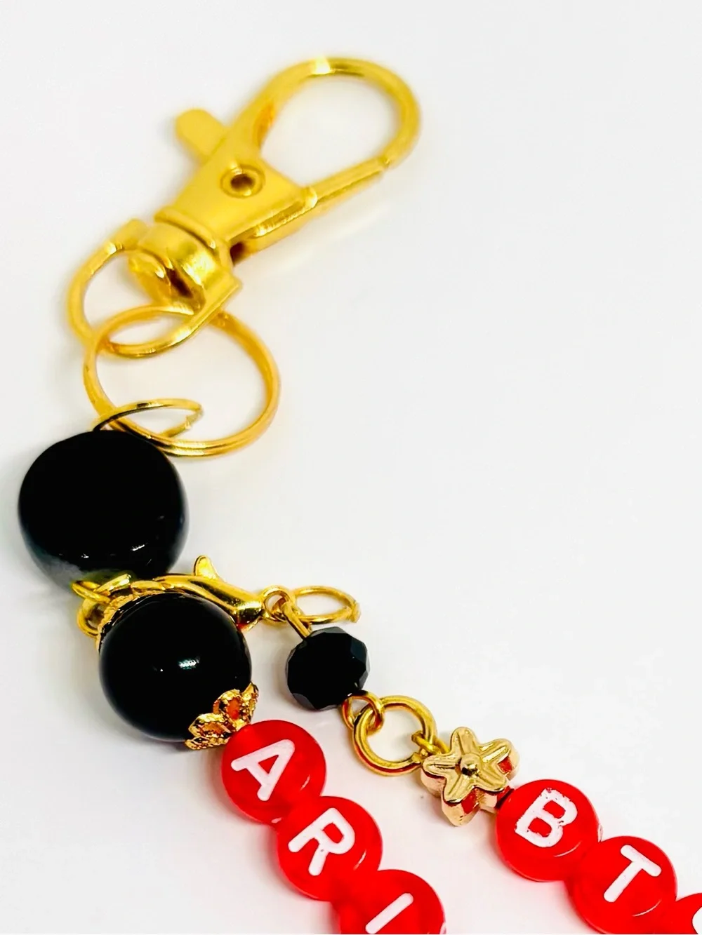 BTS ARIRANG RED GOLD BLACK BEADED KEYCHAIN